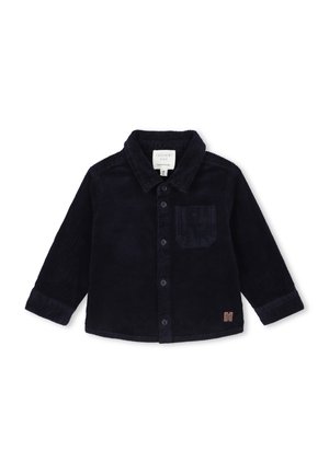 Schwarzes Cord-Hemd mit langen Ärmeln, Knopfleiste vorne, einer Brusttasche, Stehkragen und kleinem braunem Logopatch nahe dem Saum.