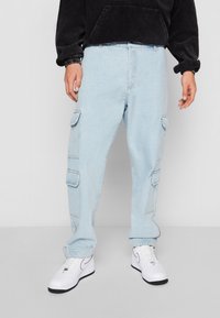 Karl Kani KK SMALL SIGNATURE - Traperice ravnih nogavica - bleached blue