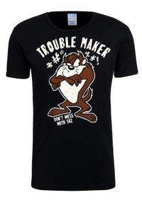 Black cotton t-shirt featuring a cartoon character with crossed arms, bold text reading "TROUBLE MAKER," and "DON'T MESS WITH TAZ."