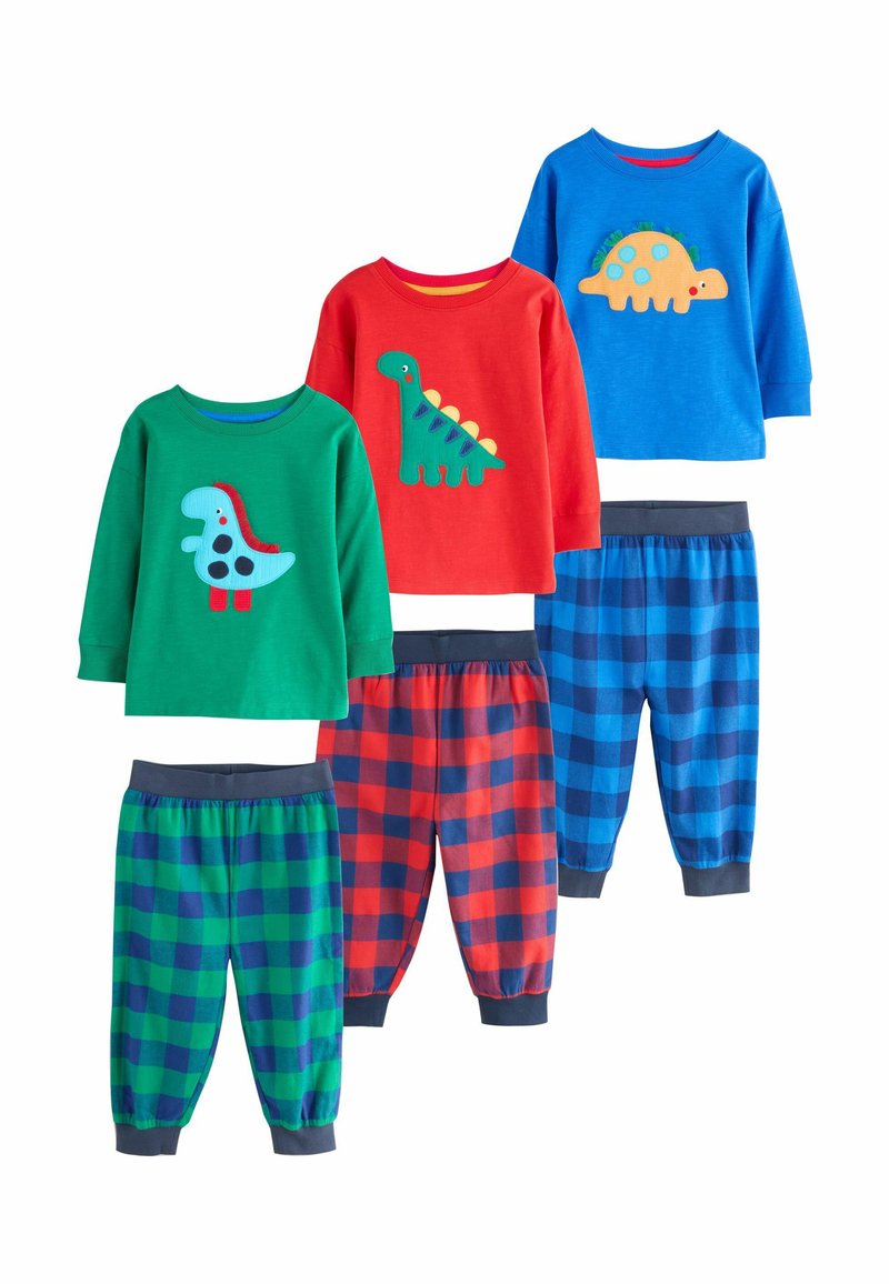 Conjunto de cuatro pijamas infantiles con camiseta y pantalones. Las camisetas llevan apliques de dinosaurios; los colores incluyen verde, rojo y azul. Los pantalones tienen patrones a cuadros.