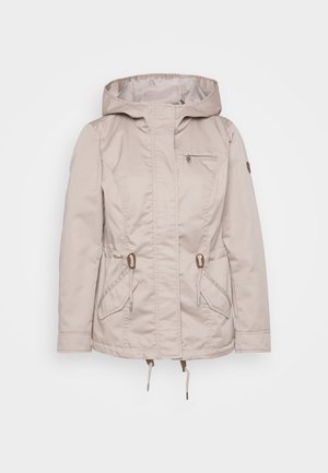 Beige waterproof jacket with a hood, adjustable drawstrings, two front pockets, and a zippered chest pocket. Smooth texture, casual design.