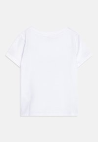Witte katoenen T-shirt met korte mouwen, ronde hals en een eenvoudig, naadloos achterdesign. Lichtgewicht en zachte textuur.
