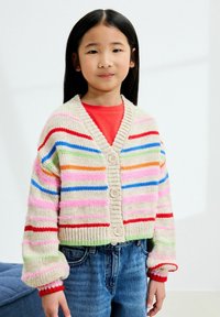 Multicolored striped cardigan, knitted, with a beige base, featuring vibrant pink, blue, red, and green stripes and three buttons at the front.