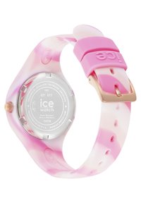 Reloj de pulsera de silicona en tonos rosa y blanco veteado, con placa trasera de plata, hebilla en oro rosa y marca "ice" grabada en el lazo de la correa.