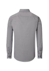 Langarmhemd mit einem geometrischen schwarz-weißen Muster, ausgestattet mit einem Kentkragen und knöpfbaren Manschetten. Sanfte Textur.