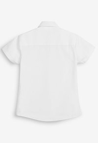 Camicia bianca a maniche corte realizzata in tessuto leggero, con colletto classico, orlo dritto e dettaglio sulla spalla posteriore.