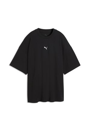 Sort oversized T-shirt med korte ærmer og et lille hvidt Puma-logo på midten foran under halsudskæringen.