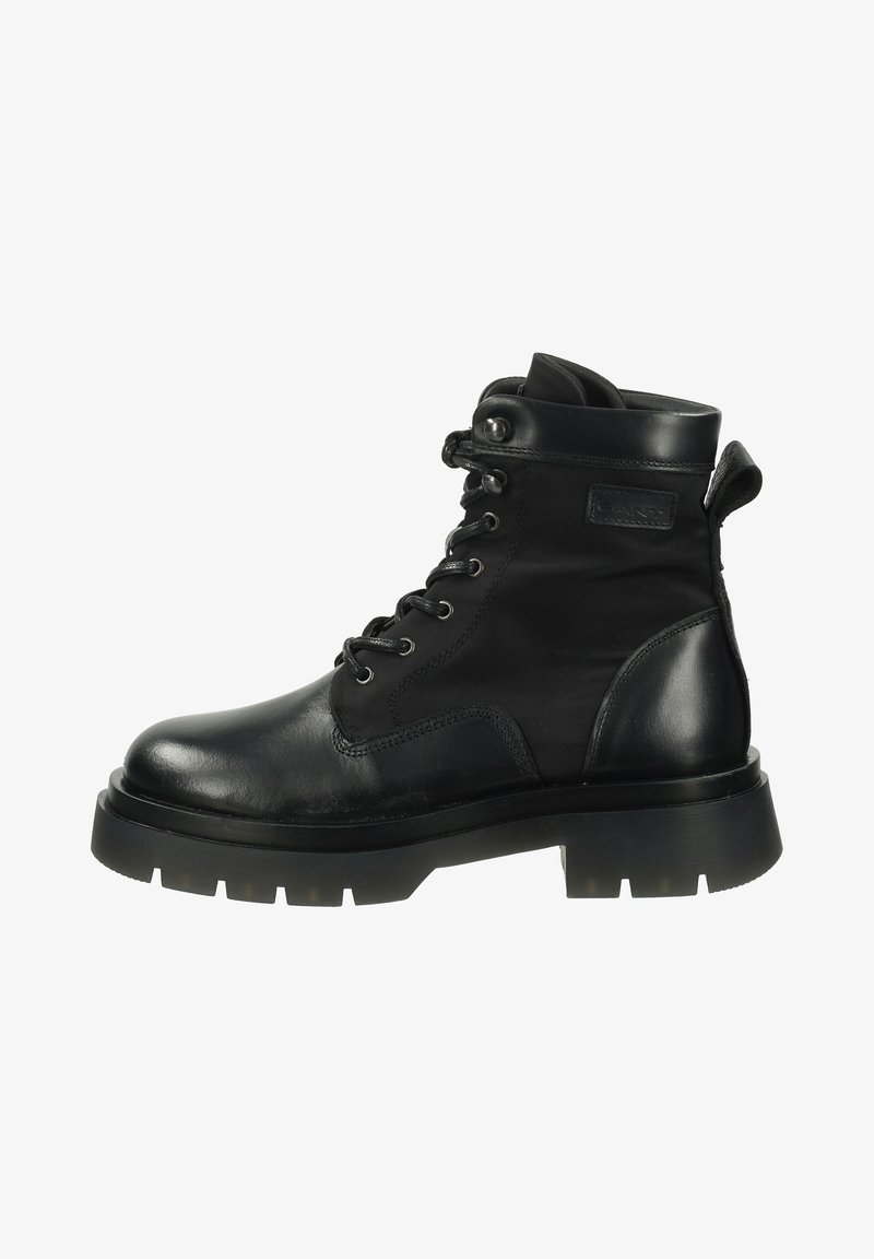 Schwarzer Schnürstiefel mit robustem Profilsohle, gepolstertem Schaft und Ziehlasche auf der Rückseite, gefertigt aus einer Mischung aus Leder und Stoff.
