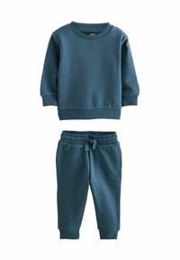 Teal bomulds træningsdragt med crewneck sweatshirt og elastisk talje på bukserne med manchetter, hvilket giver en komfortabel pasform og afslappet stil.