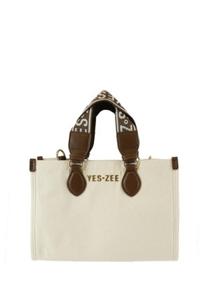 Borsa tote in tela beige con manici e dettagli in pelle marrone, con logo "YES·ZEE" e ampie tracolle in tessuto con testo bianco.