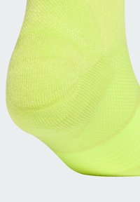 adidas Performance UNISEX żółty