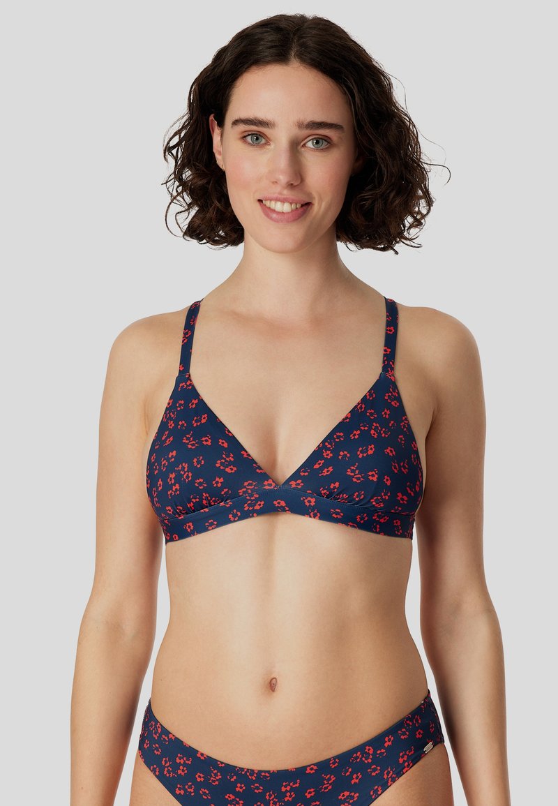 Mørkeblå bikini-top med et blomsterprint i rødt. Trekantet design, tynde stropper og en behagelig pasform. Glat tekstur.