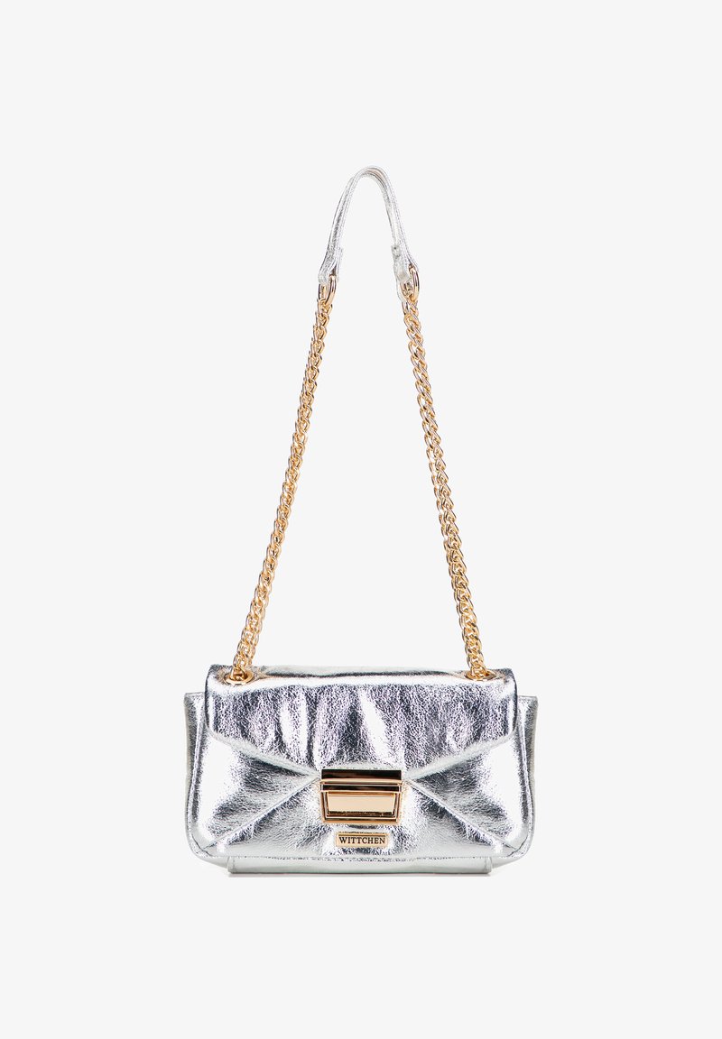 Silver metallic handbag with chain strap, featuring a fold-over flap, gold-tone hardware, and a central clasp with brand logo detail.