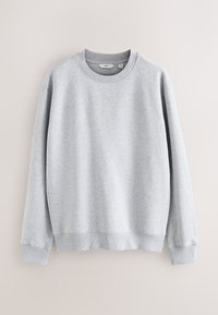 Felpa grigio chiaro realizzata in morbido misto cotone, con scollo tondo e polsini a costine, dalla vestibilità comoda. Nessun motivo visibile.