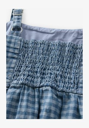 Vestito a quadri blu con corpino arricciato. Presenta un design strutturato e arricciato, spalline regolabili e una sezione superiore liscia di colore blu a contrasto.