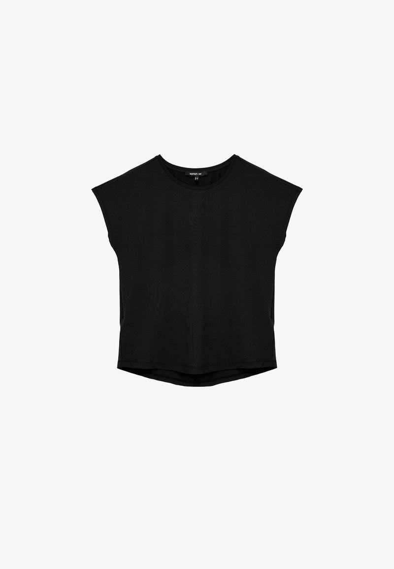 Mustahu ppüri top, mis on valmistatud pehmest kangast, millel on lühikesed varrukad, ümmargune kaelus ja veidi kõver hem. Sile tekstuur, ilma nähtavate mustriteta.