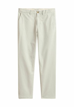 Pantalon chino beige clair à jambes droites avec poches avant, passants pour ceinture, fermeture par bouton et étiquette de la marque à l'intérieur de la ceinture.