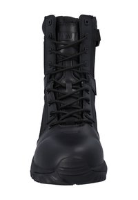 Black tactical boot with high ankle, reinforced toe, laces, side zipper, and "MAGNUM" logo on padded tongue.