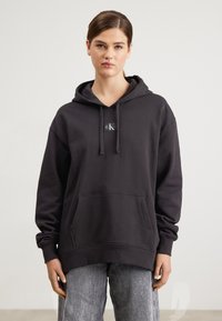 Calvin Klein Jeans - LABEL OVERSIZED HOODIE - Sweatshirt - black Thumbnail Image 1