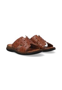 Bruine leren sandalen met een gestructureerde bovenkant, open teen en kruisbanden. Kurk- en rubberen zool, met een zwarte gestructureerde rand voor grip.