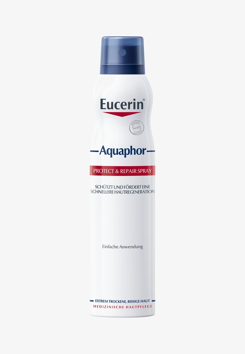 Eucerin Aquaphor Protect & Repair Spray in einer weißen zylindrischen Flasche mit einem blauen Deckel. Enthält blaue Schriftzüge und ein Etikett mit Verwendungshinweisen.