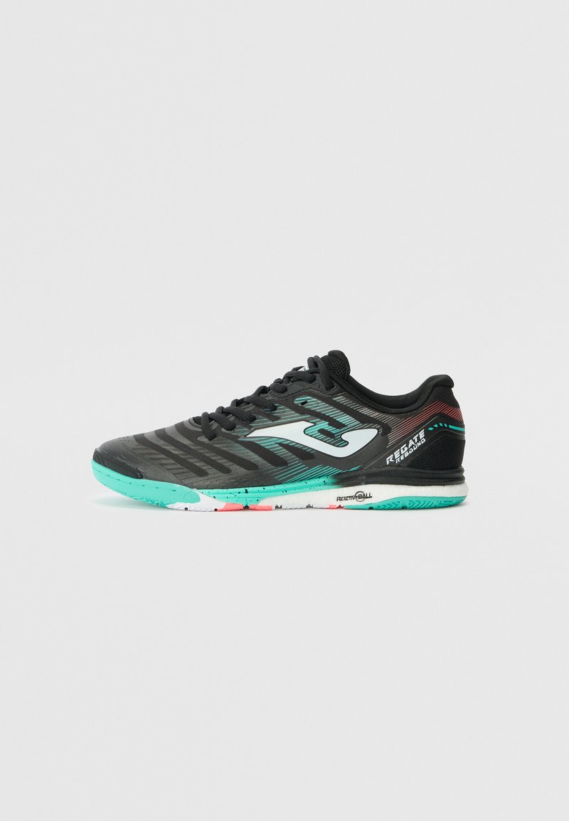 Black athletic shoe with mint green sole and accents. Features textured upper, contrasting white logo, and a bold red and white patterned sole.