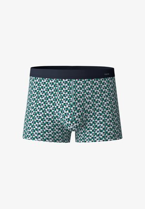 Boxers aus einem weichen Material, mit einem geometrischen Muster in Grüntönen, Weiß und Marineblau, sowie einem einfarbigen Marineblauem Bund.