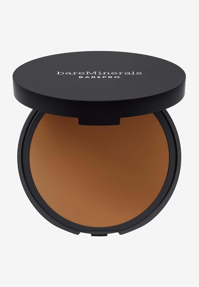 BareMinerals BAREPRO pressed powder in a black round compact. Smooth matte bronze shade, featuring a sleek lid with logo.