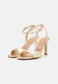 ALDO SAKE - Varrelliset sandaalit - gold