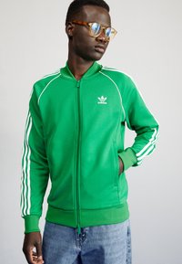 adidas Originals - Training jacket - green/white Thumbnail Image 1