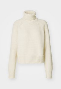 Cremefarbener Rollkragenpullover, gerippter Ausschnitt und Bündchen, grob gestrickte Textur, lockere Passform, cropped Länge und nahtlose Raglanärmel.