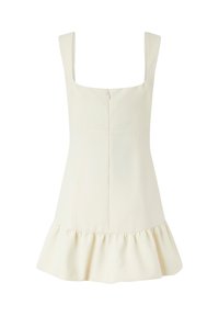 Vestido de color crema con escote cuadrado, cuerpo ajustado y dobladillo con volantes acampanados. Cuenta con una cremallera en la parte posterior para el cierre.