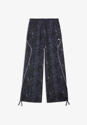 Pantalon ample bleu foncé et noir imprimé léopard, taille élastique, détails en passepoil blanc, logo Puma et liens réglables aux ourlets.