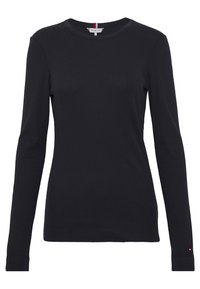 Musta pitkähihainen pehmeästä puuvillasta valmistettu paita, jossa on pyöreä pääntie, istuva siluetti ja hillitty logoyksityiskohta helmassa.