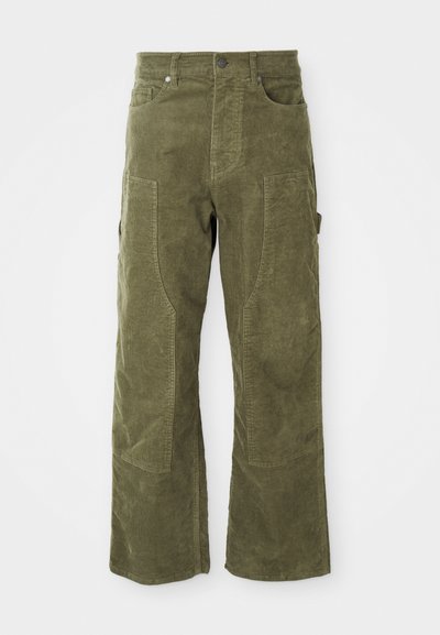 Olive green corduroy pants with front and side pockets, reinforced knee panels, and a button and zipper closure.