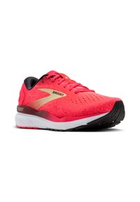 Zapatilla de running con parte superior de punto rosa, acentos negros y media suela blanca. Presenta un discreto logo dorado y suela exterior texturizada negra.