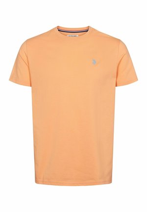 Krátky rukáv tričko v svetloružovej farbe, vyrobené z bavlny. Obsahuje okrúhly výstrih a malé modré logo na ľavej hrudi. Hladká textúra.