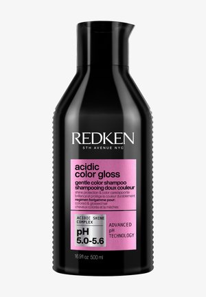 Zwarte fles van Redken Acidic Color Gloss zachte kleuring shampoo met roze etiket, pH 5,0-5,6, 500 ml, ontworpen voor gekleurd, glanzend haar.