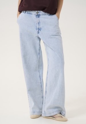 Light blue wide-leg jeans made of denim, featuring front pockets, a metal button closure, and subtle fading details along the fabric.