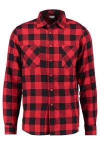 Rood en zwart geblokt overhemd met lange mouwen en knopen, met twee borstzakken en een kraag, maat medium.