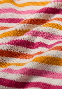 Knitted fabric featuring bold, wavy stripes in pink, orange, and yellow, with a soft texture and a white background.