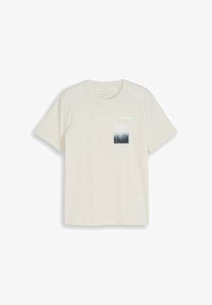 Tricou de culoare off-white cu mânecă scurtă și guler rotund, cu un mic grafic estompat al unui peisaj urban și un text discret în partea superioară dreaptă față.