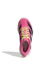 Pink athletic shoe with black accents, textured fabric upper, bright yellow laces, and white sole. “ADIZERO” logo visible on tongue.