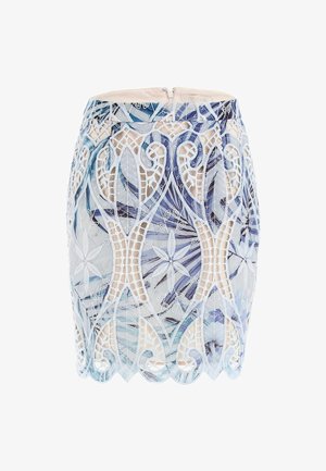 Blue and white mini skirt featuring intricate lace overlay, floral patterns, and scalloped hem. Closed with a discreet zipper at the back.