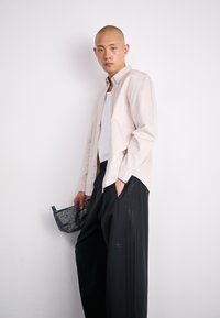 adidas Originals Calças de fato de treino - black