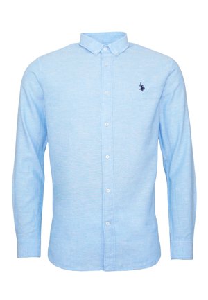 Light blue long-sleeve shirt made of linen. Features a button-down collar and a small navy logo on the chest. Smooth texture, regular fit.