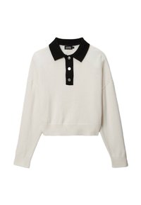 Pull court de couleur crème avec un col noir, trois boutons argentés à l'avant, et une texture côtelée à l'ourlet et aux poignets.