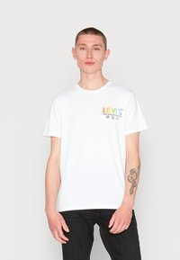 Levi's® COMMUNITY TEE UNISEX - T-shirt estampada - white