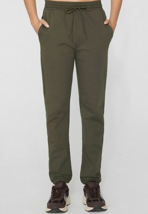 JOGGING MIT PASPELTASCHEN UND TUNNELZUG - Jogginghose - green