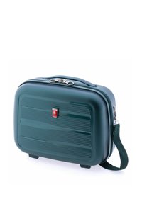 Funda de viaje rígida en verde oscuro, de forma rectangular con un patrón de estrías horizontales, cremallera plateada y un asa verde desmontable.